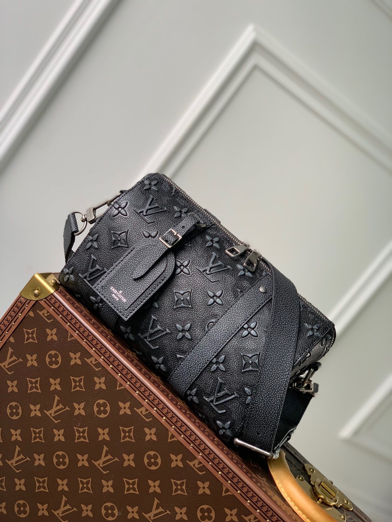 LV City Keepall bag in Monogram Shadow calf leather.