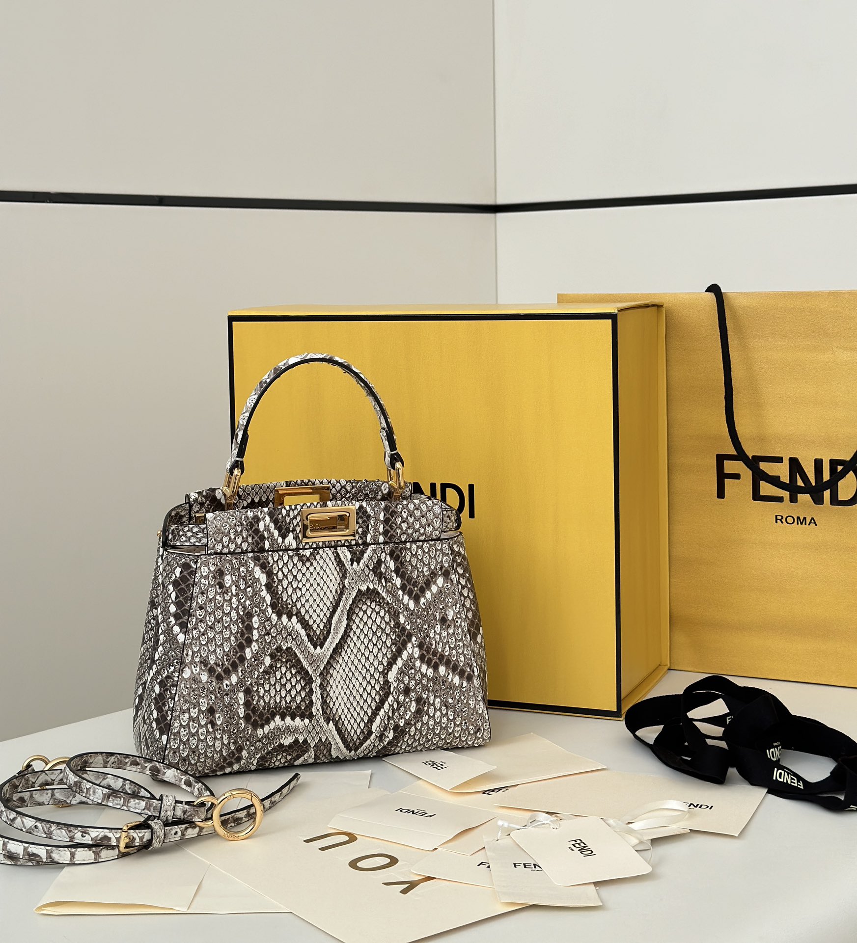 Fendi Peekaboo Mini bag in natural-colored python leather