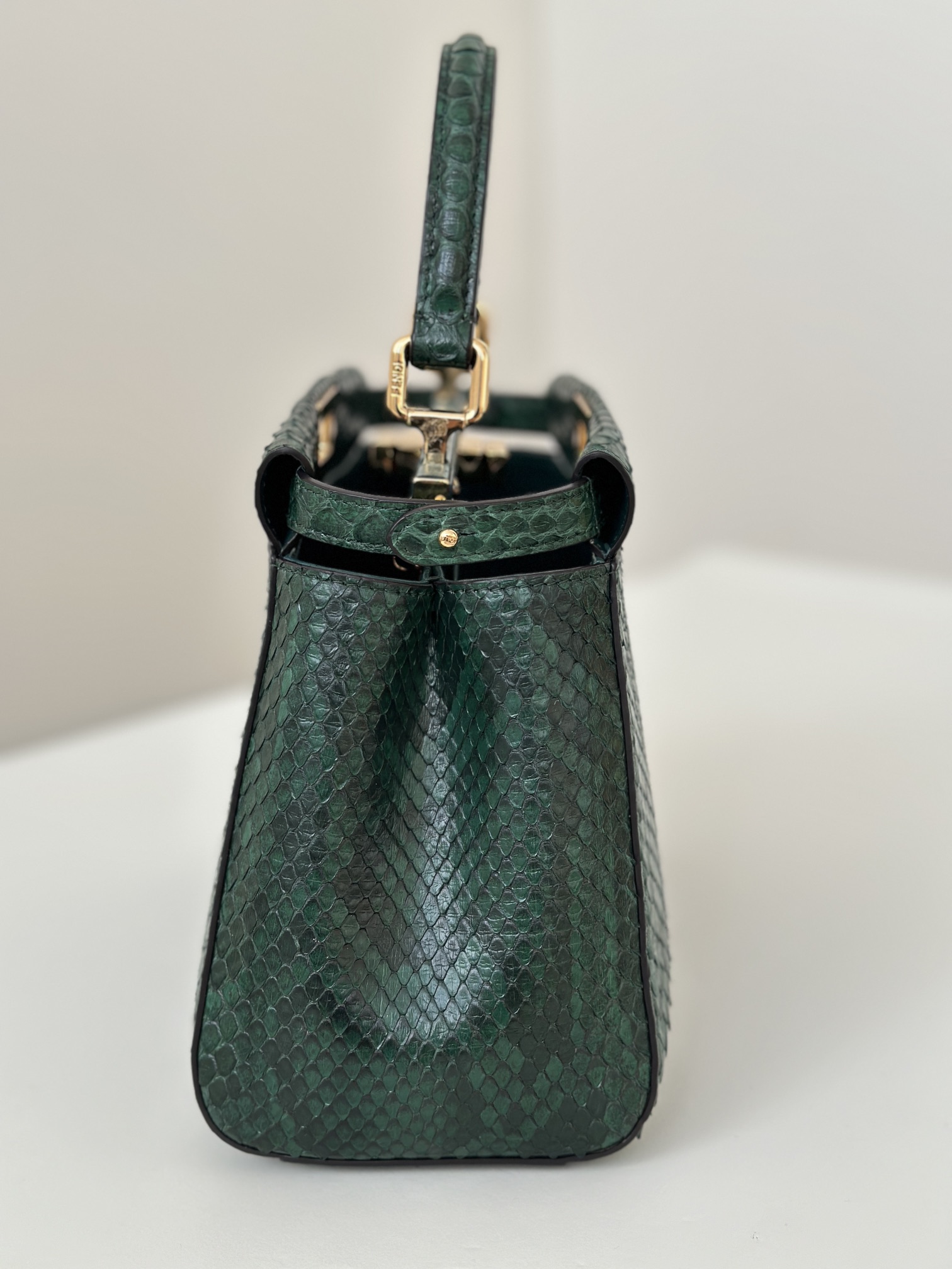 Fendi Peekaboo Mini bag in green snakeskin leather.