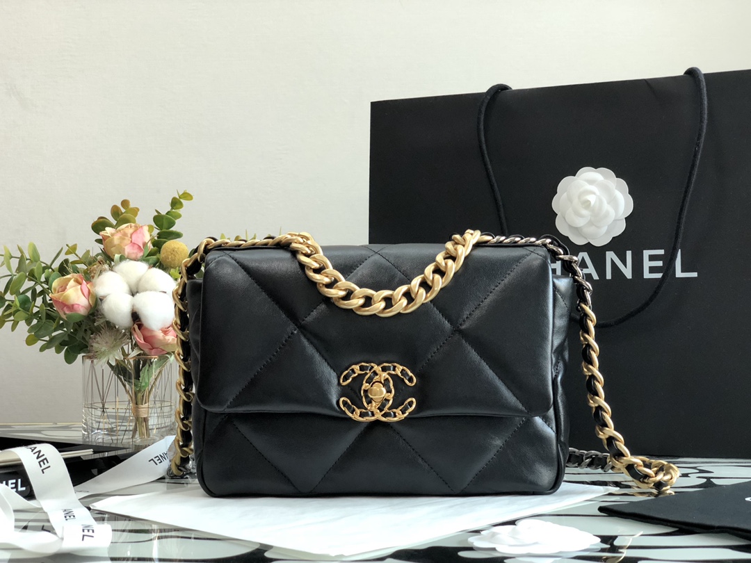 Chanel 19 handbag in black shiny lambskin with gold-tone, silver-tone, and ruthenium-finish metal hardware