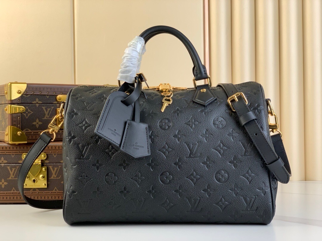 LV Speedy Bandouliere 30cm black Monogram Empreinte leather.