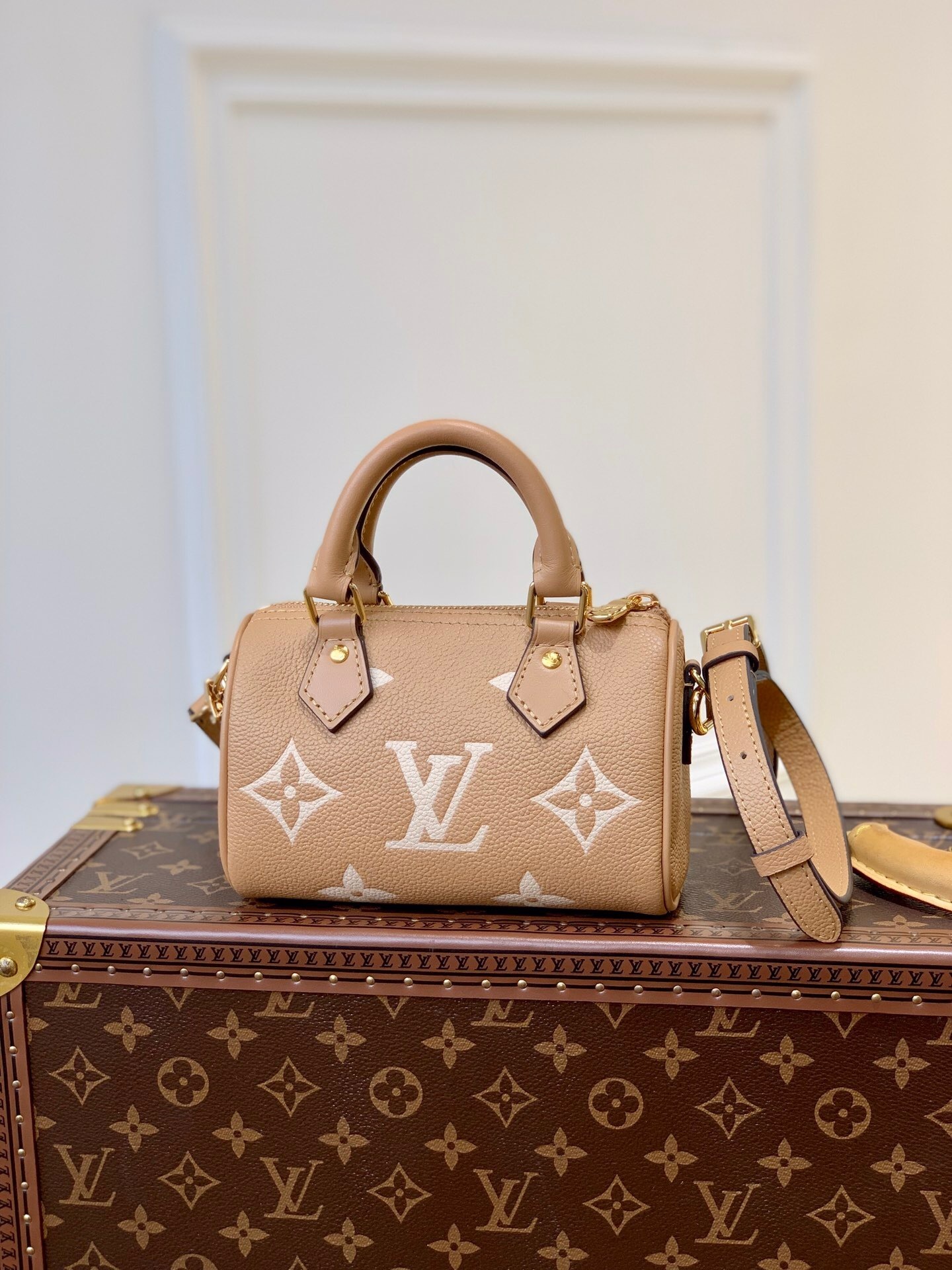 LV Nano Speedy Monogram Empreinte bag in the Arizona Beige and Cream color