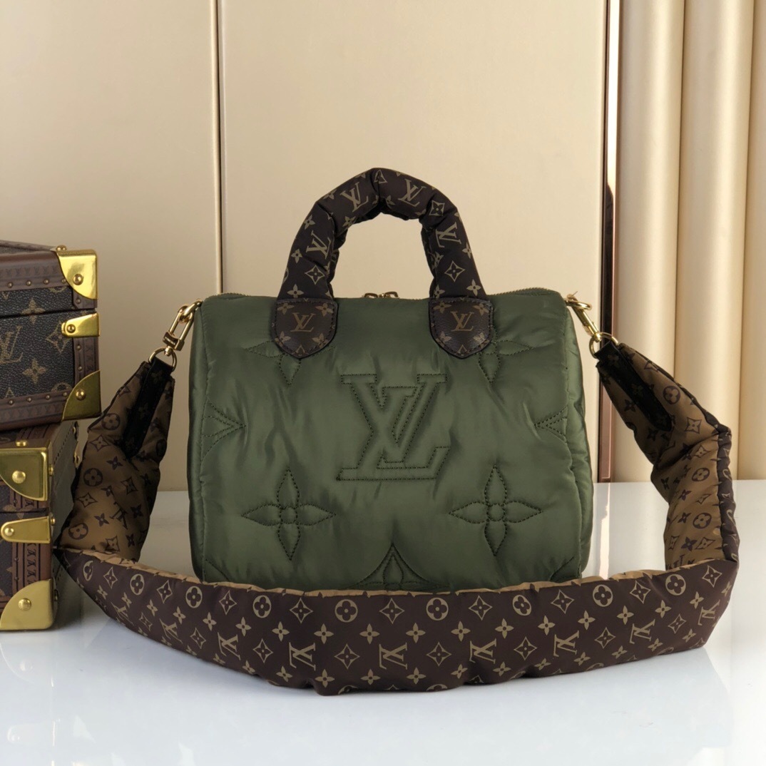 LV Speedy Bandoulière 25 padded recycled-nylon top-handle bag.