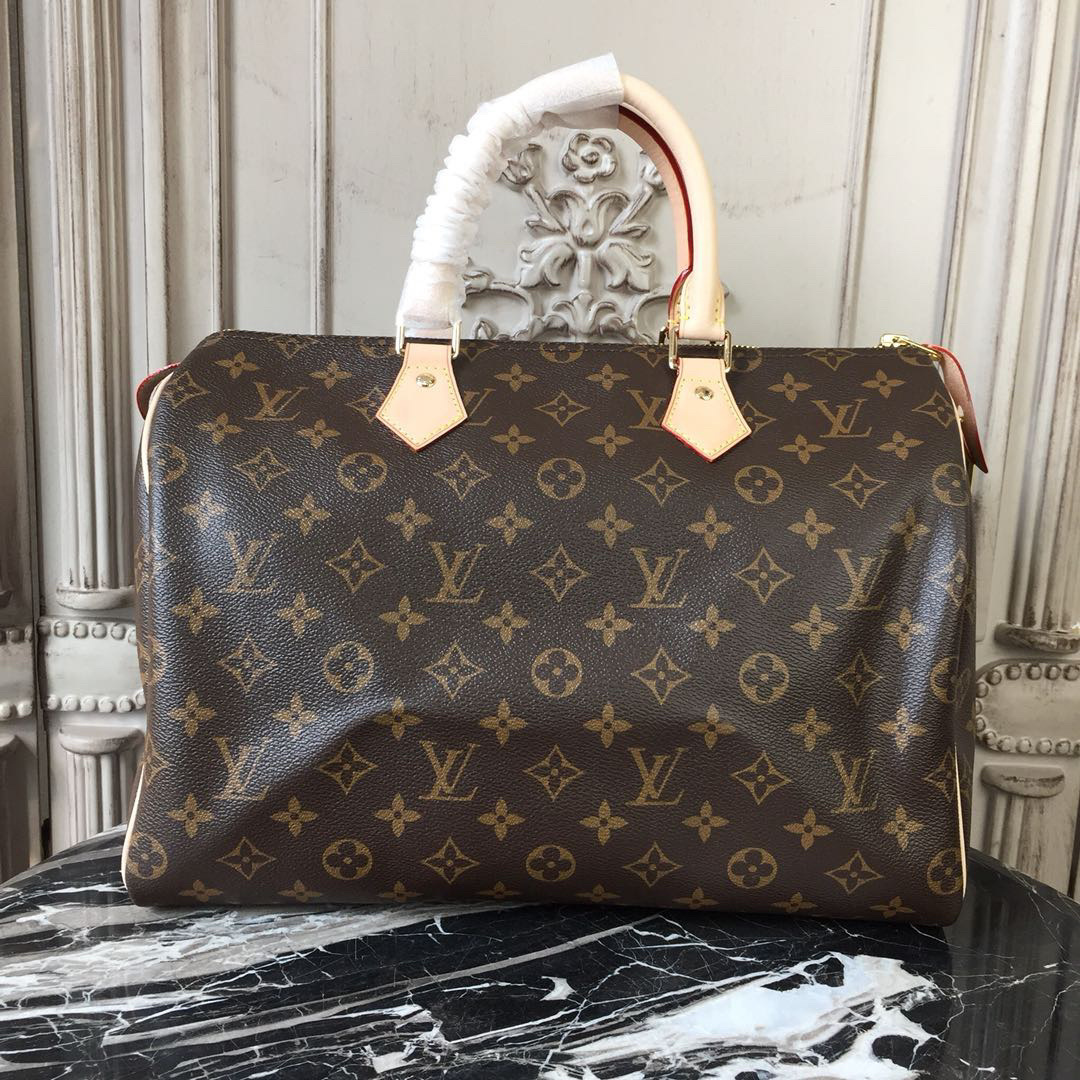 LV Speedy Bandouliere 30 bag in Monogram canvas.