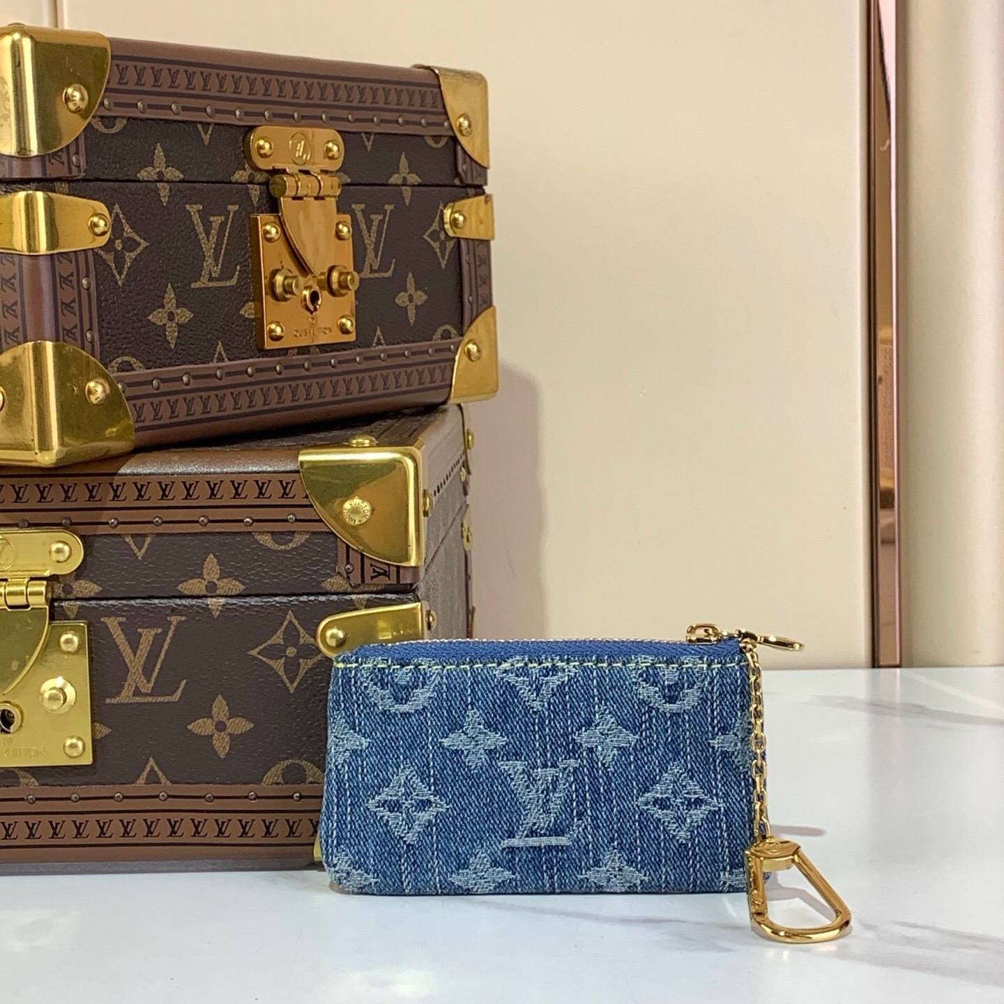 LV x Takashi Murakami Cherry Key Pouch in blue monogram denim.