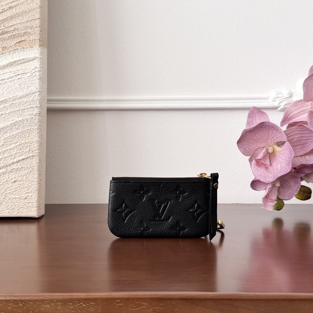 LV Key Pouch in Monogram Empreinte leather.