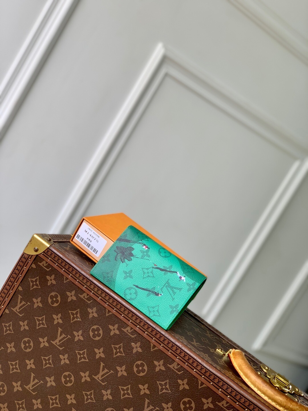 LV Passport Cover in Monogram canvas.