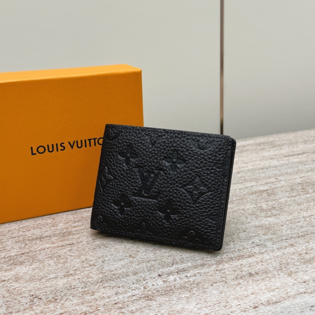 LV Multiple Wallet in Monogram Taurillon Leather.