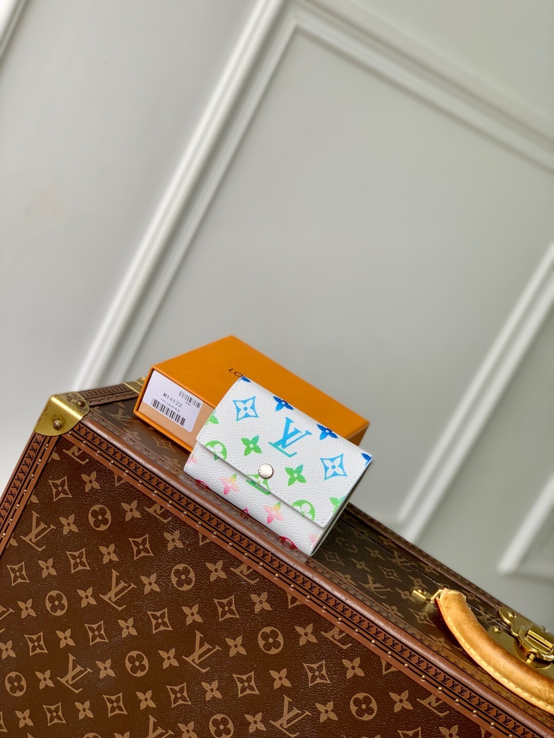 LV Victor wallet in Monogram Iridescent canvas.