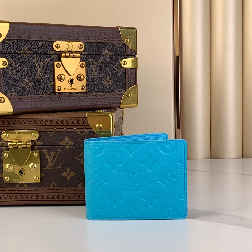 LV Multiple Wallet in turquoise Taurillon Monogram leather.