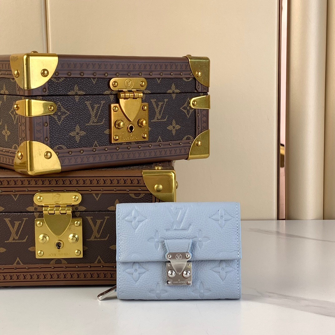 LV Métis Compact Wallet in Monogram Empreinte leather.