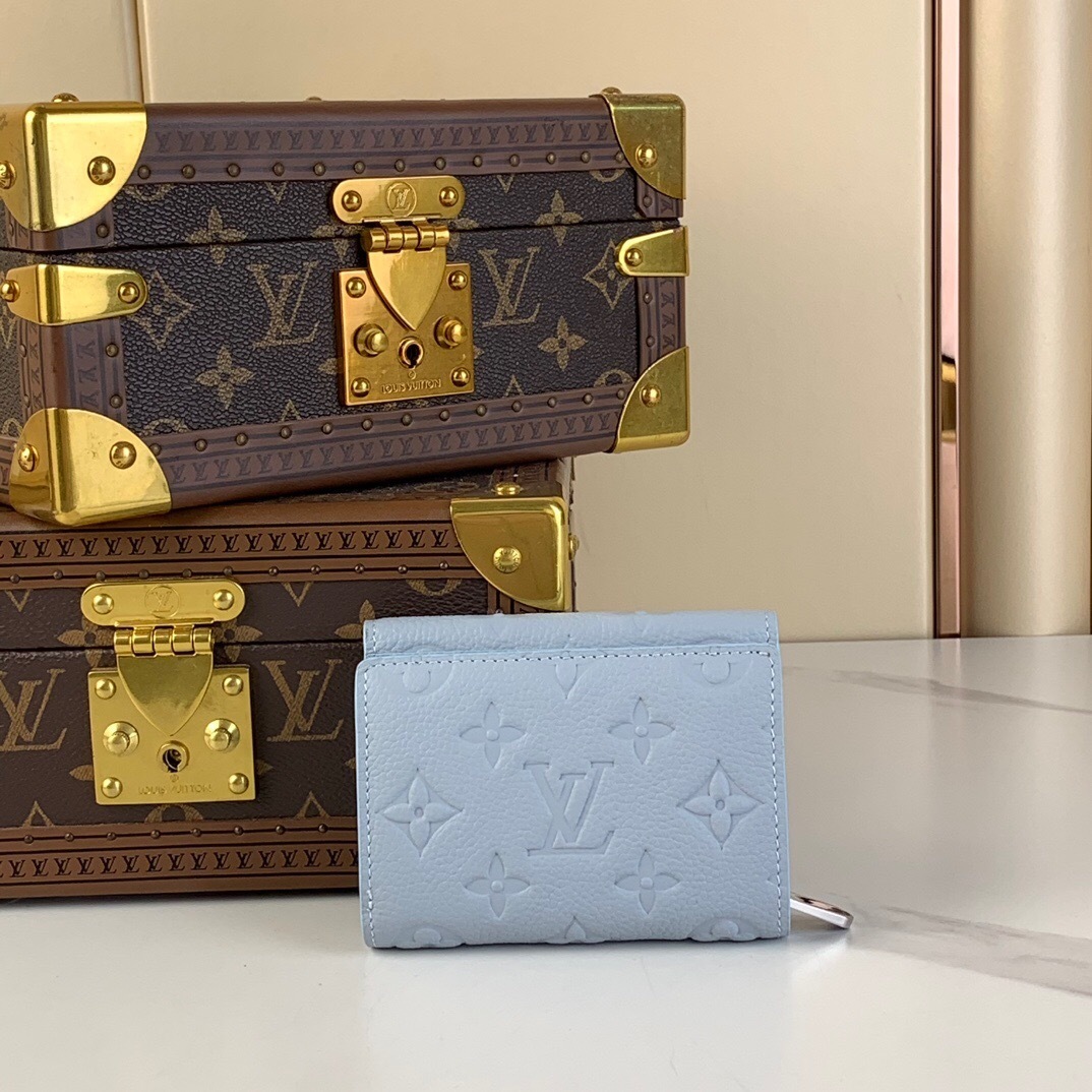 LV Métis Compact Wallet in Monogram Empreinte leather.