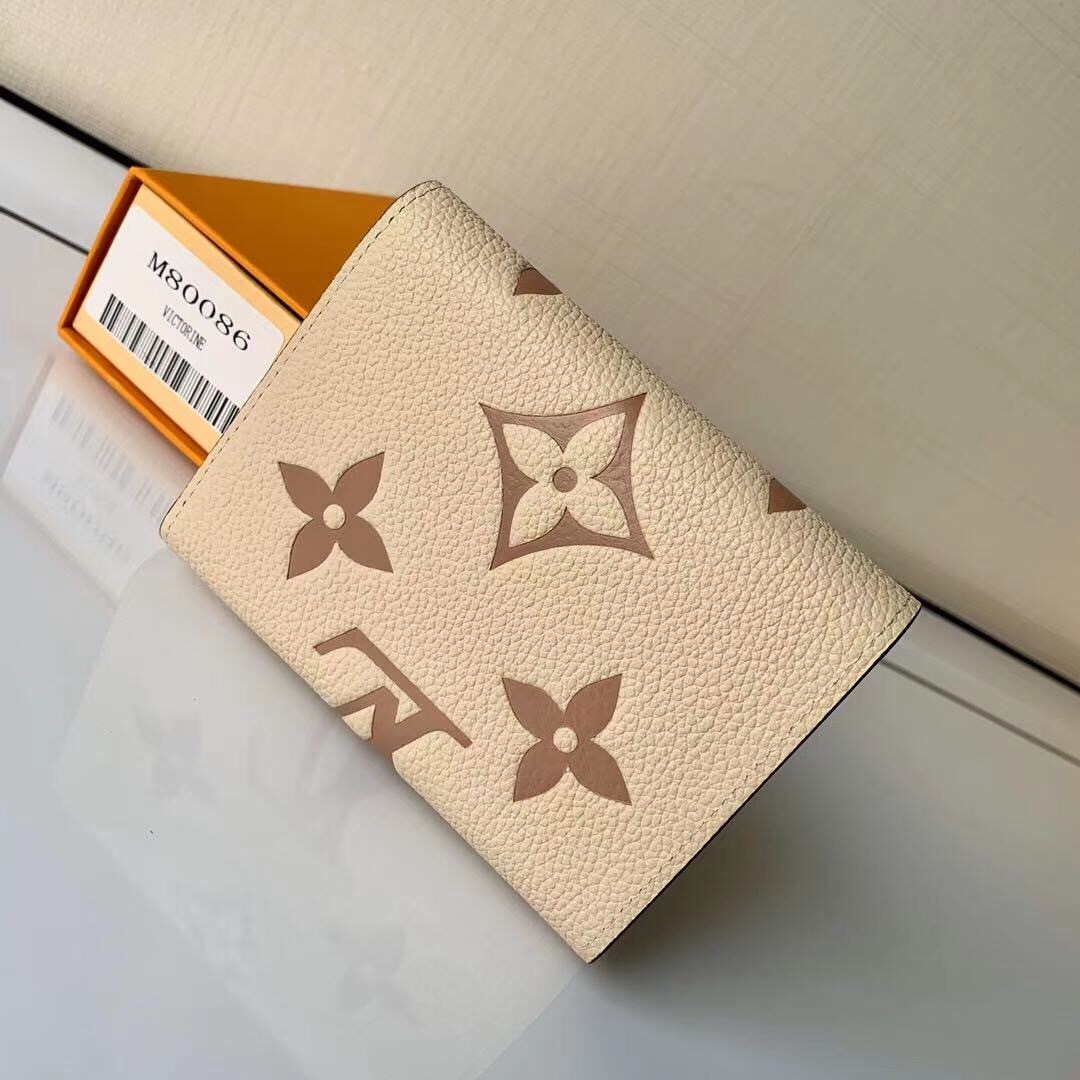 LV Victorine Wallet in a bicolor Monogram Empreinte leather