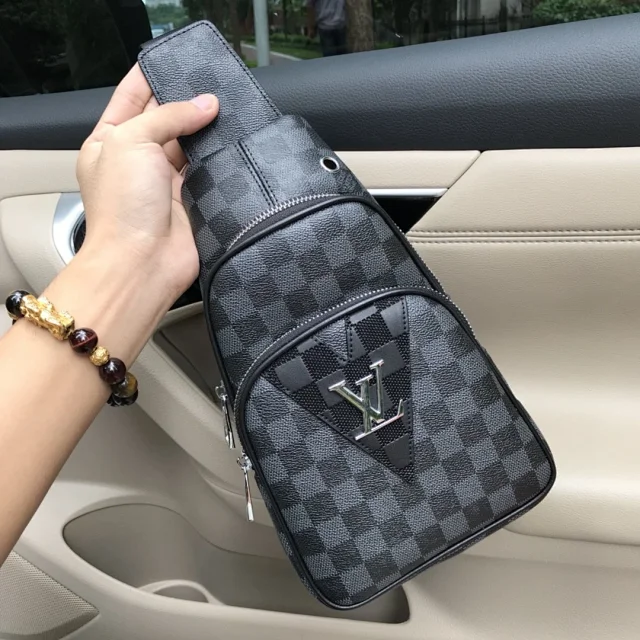 LV sling bag with a checkered pattern and the brand's logo on the front