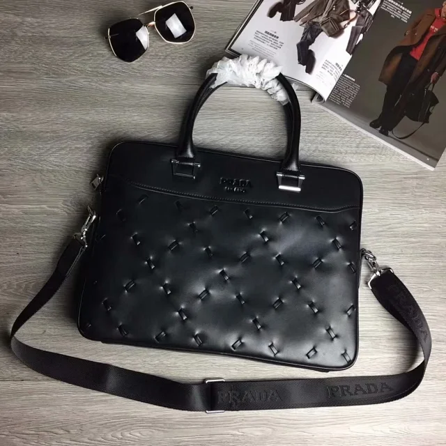 Prada Symbole bag black leather briefcase-style laptop bag triangle pattern.