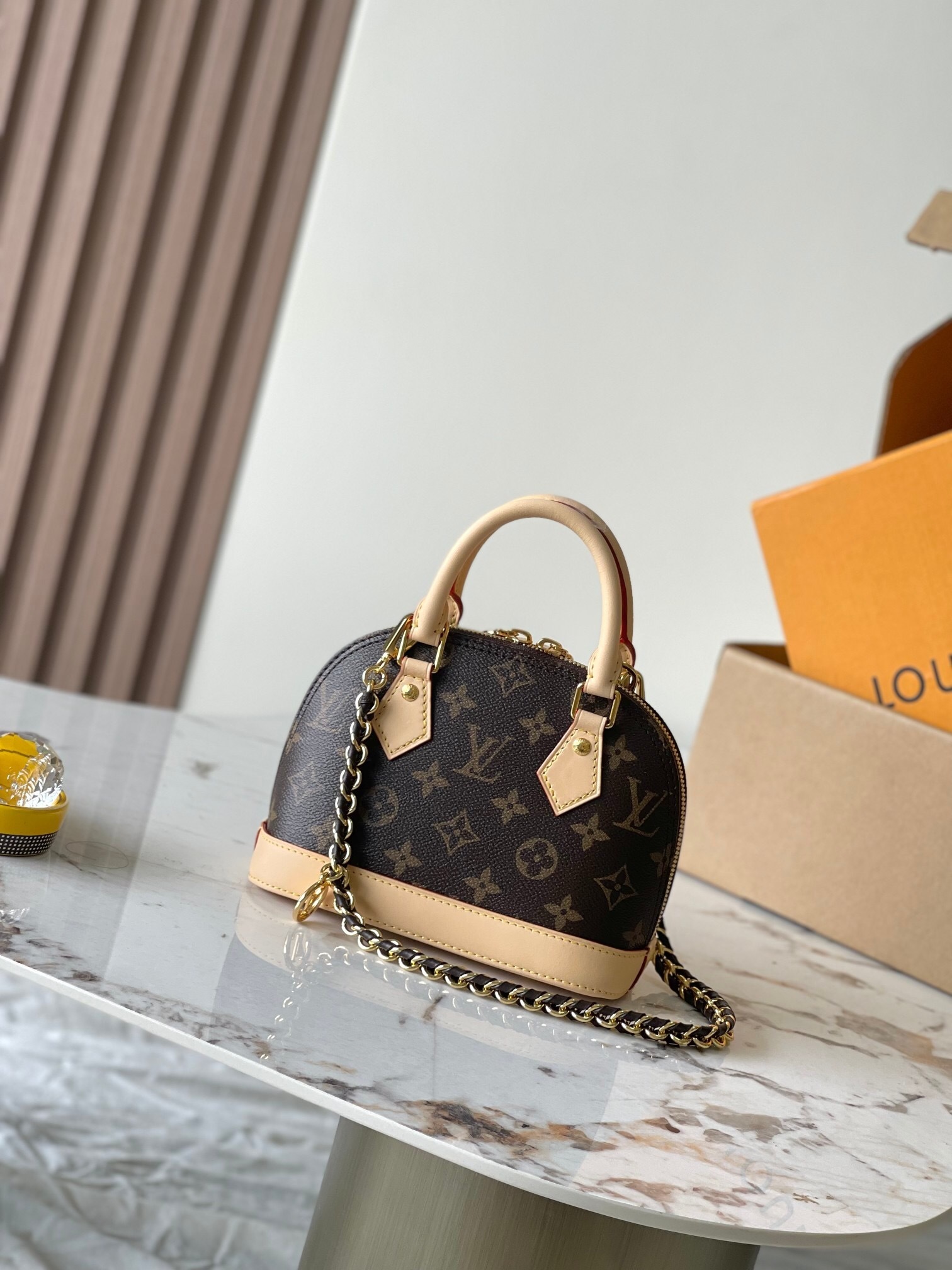 LV Alma BB handbag in Monogram canvas