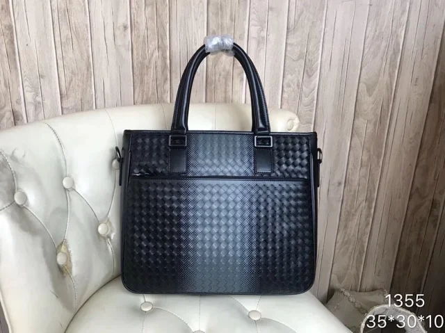 Bottega Veneta Getaway slim briefcase bag in black woven leather design