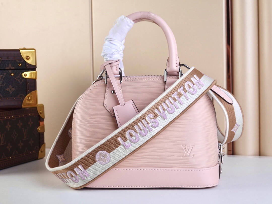 LV Alma BB handbag in pink Epi leather with a jacquard strap