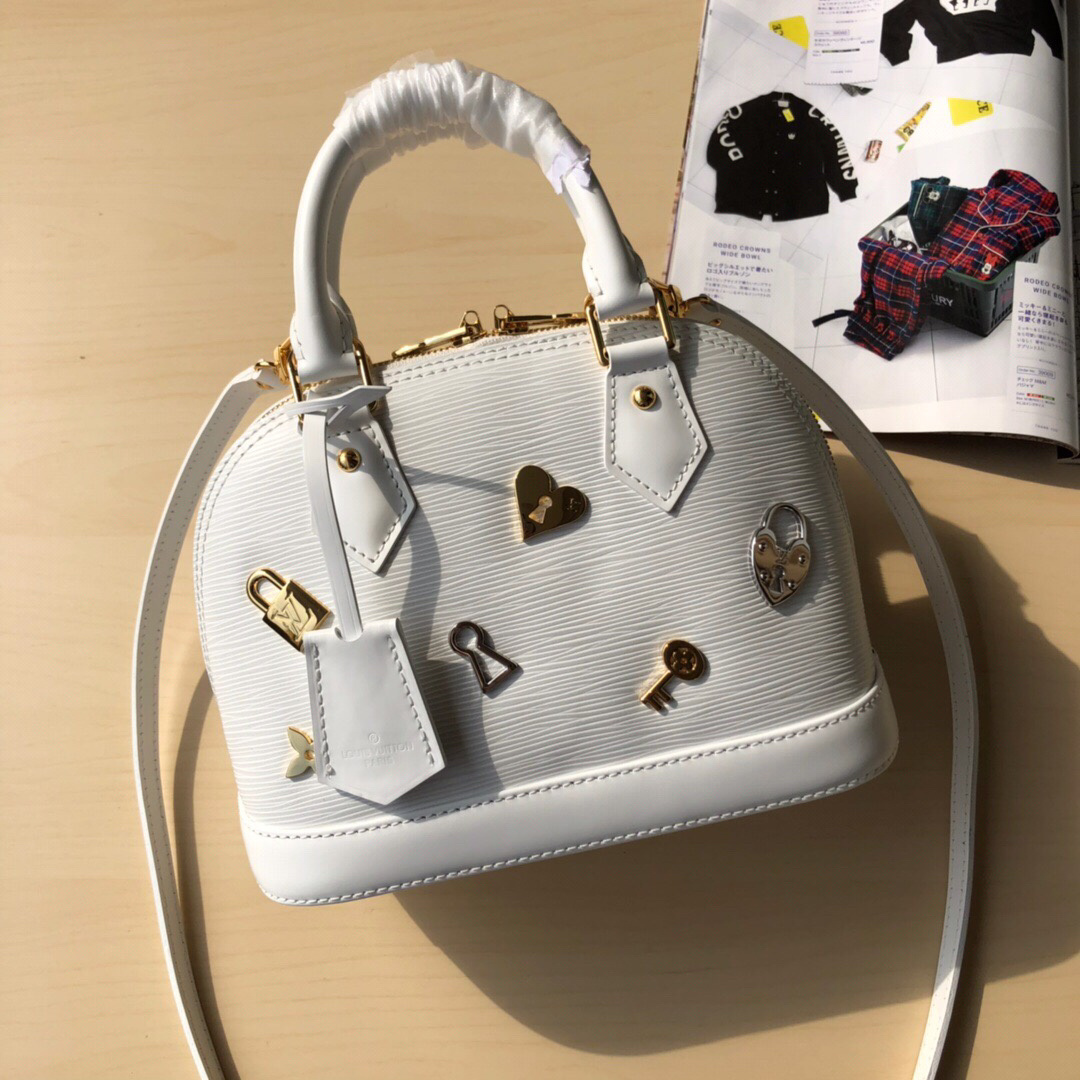 LV Epi Love Lock Alma BB bag in white