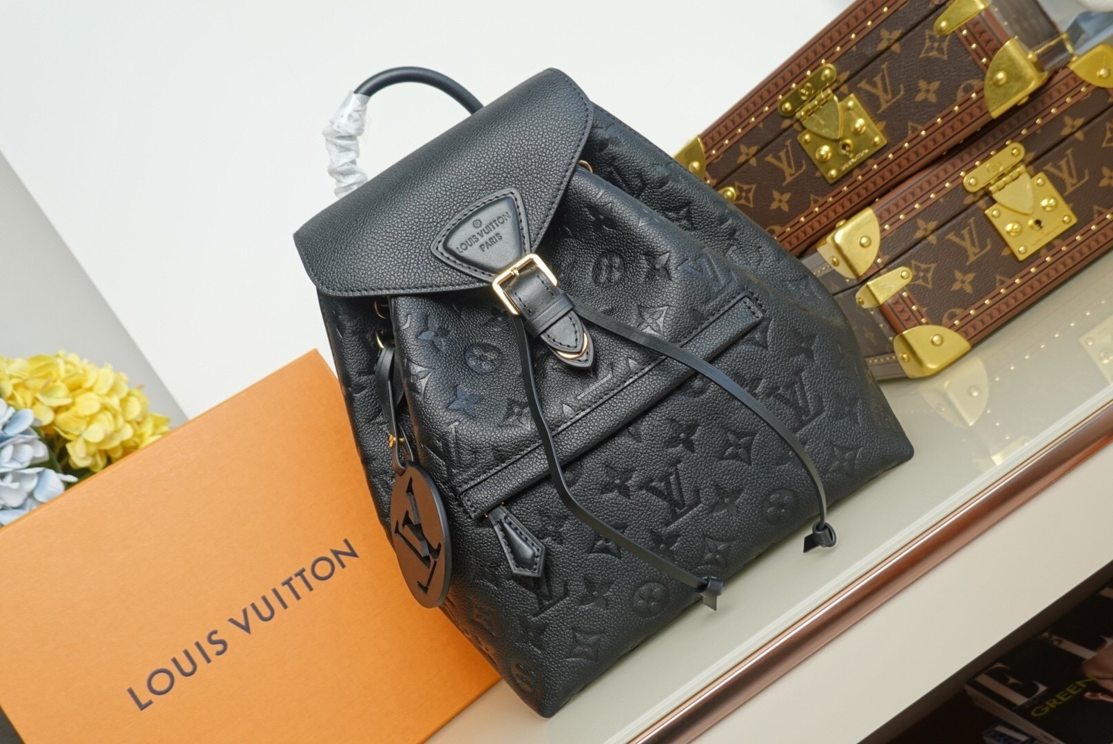 LV Montsouris backpack in black Taurillon leather embossed with the Monogram motif