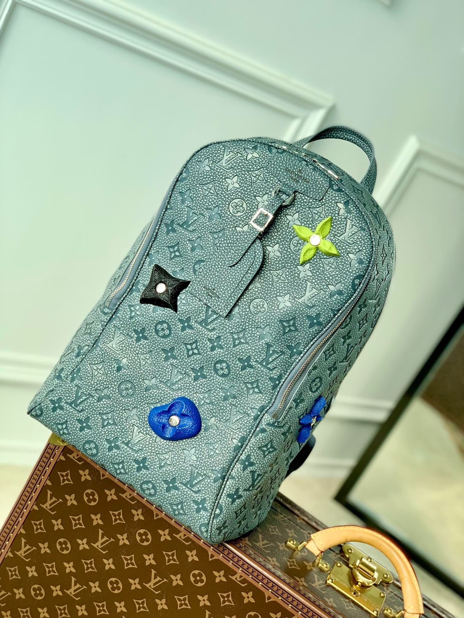 LV Taurillon Monogram Climbing Ellipse Backpack in granite