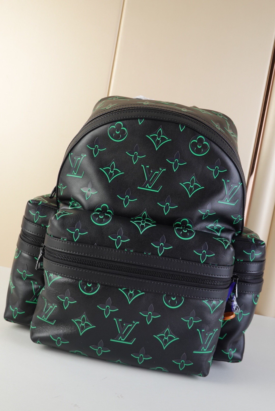 LV Montsouris Backpack in black monogram denim with a gradient treatment of the colored LV Initials