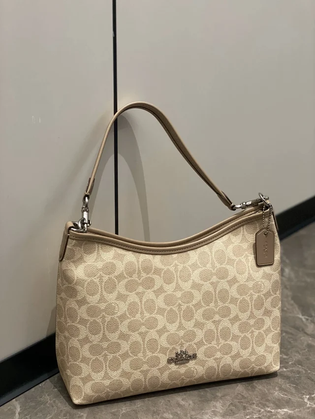 Coach Laurel Shoulder Bag in Signature Canvas.