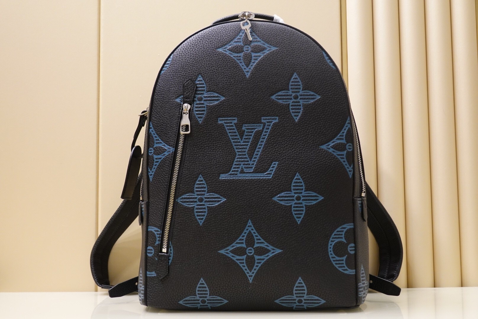 LV Taurillon Armand Backpack in black with the Monogram Seal pattern