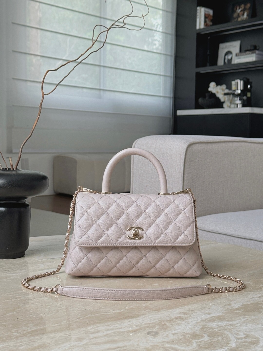 Chanel Coco Handle Flap bag in light pink caviar leather