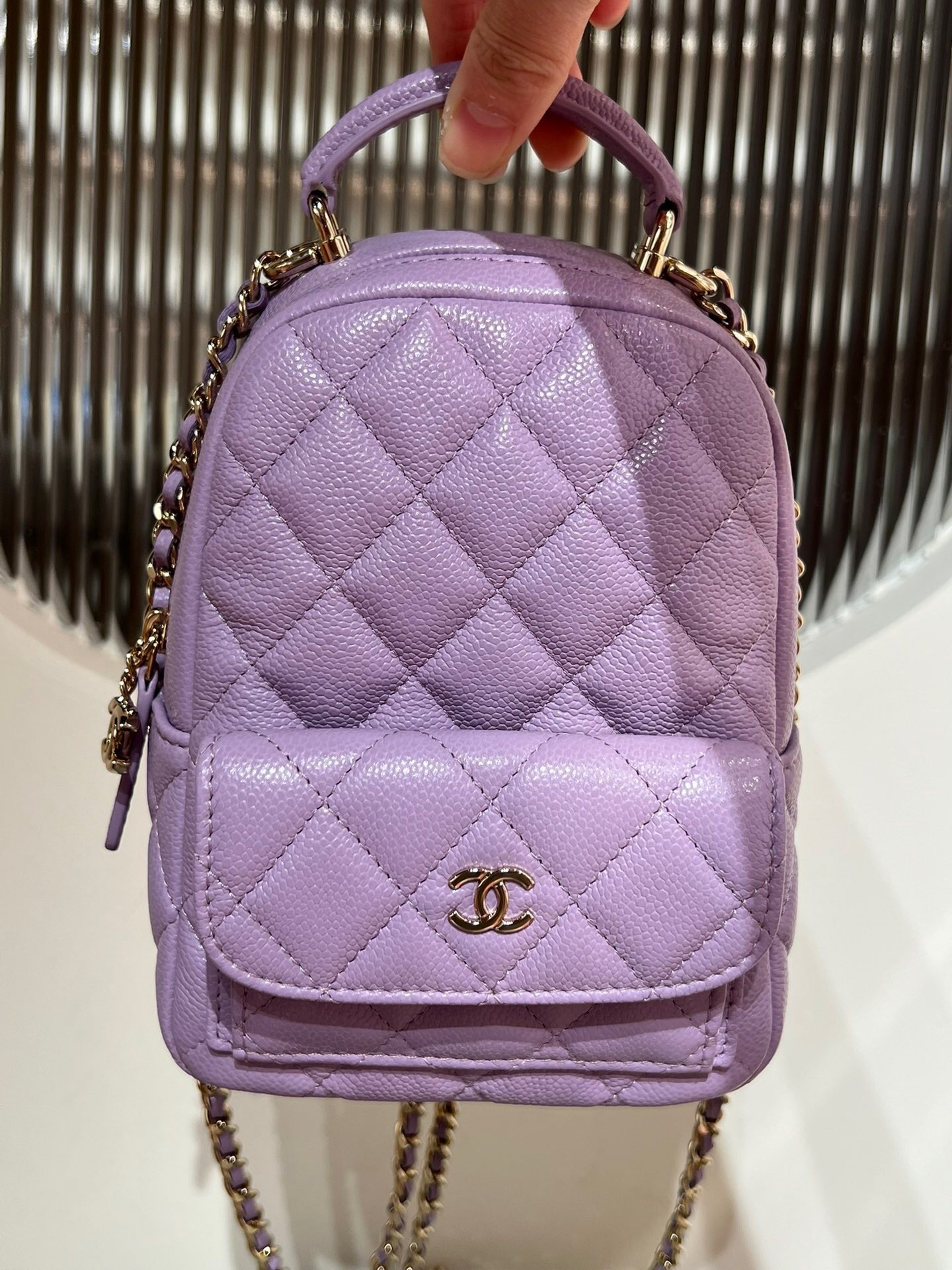Chanel Caviar Quilted CC Mini Classic Backpack in lilac leather.