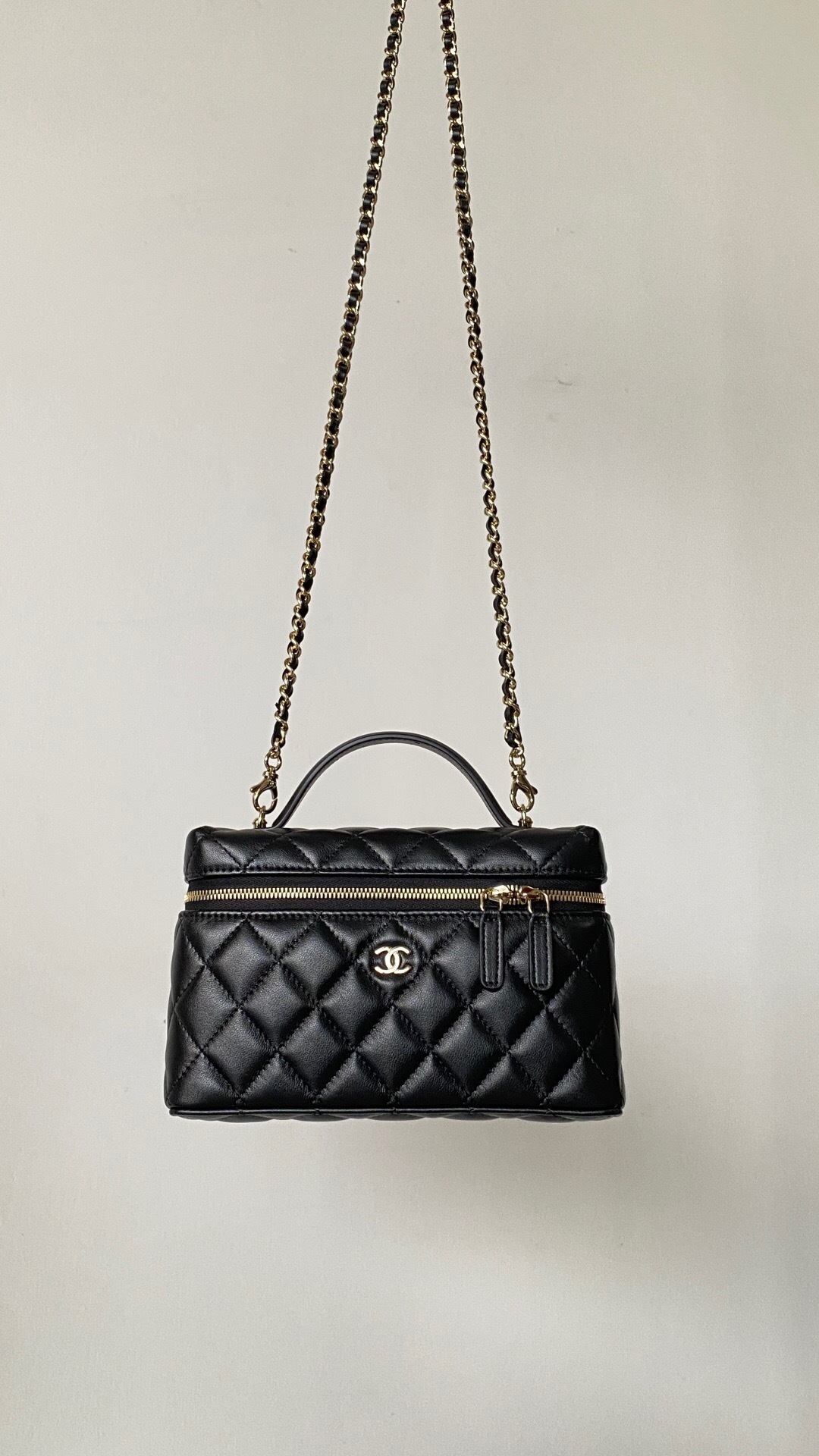 Chanel 25C Vanity with Chain in black caviar leather.
