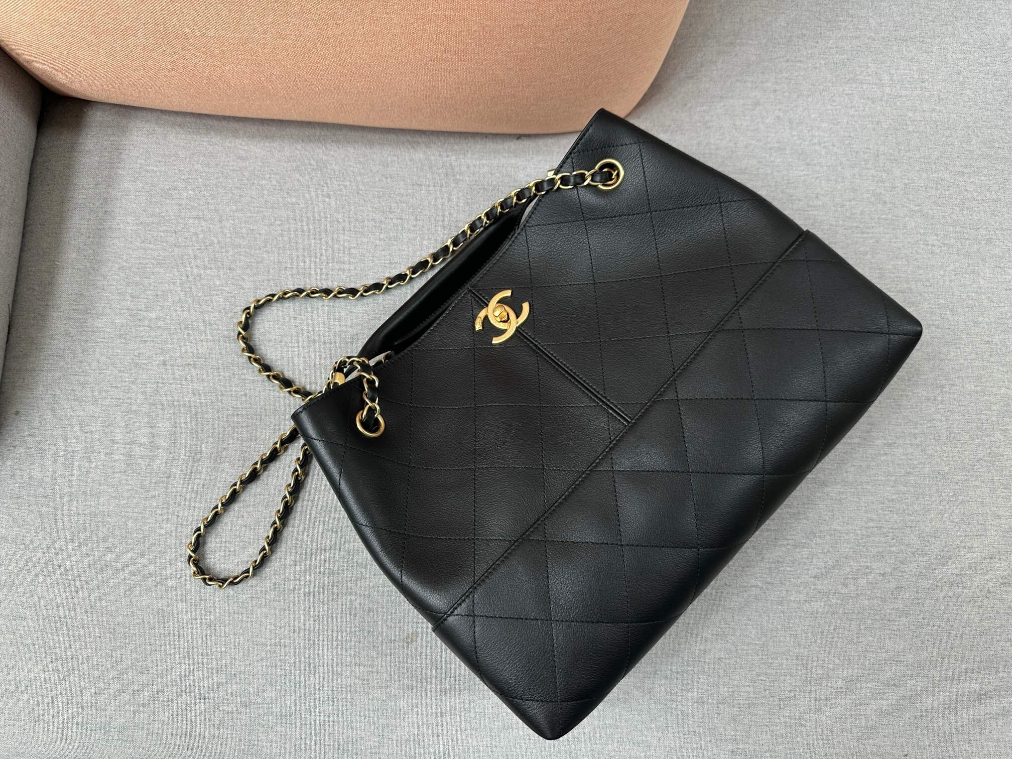 Chanel hobo bag black with a quilted pattern and gold-tone hardware
