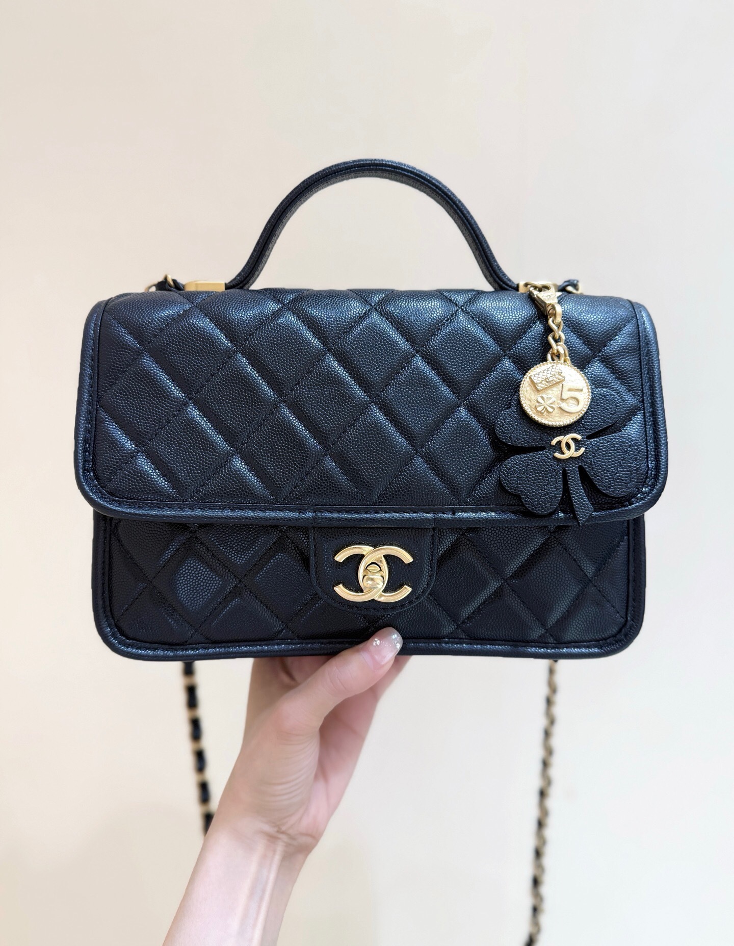 Chanel 25B Four-Leaf Clover Gold Coin Messenger Bag in black quilted calfskin leather with gold hardware