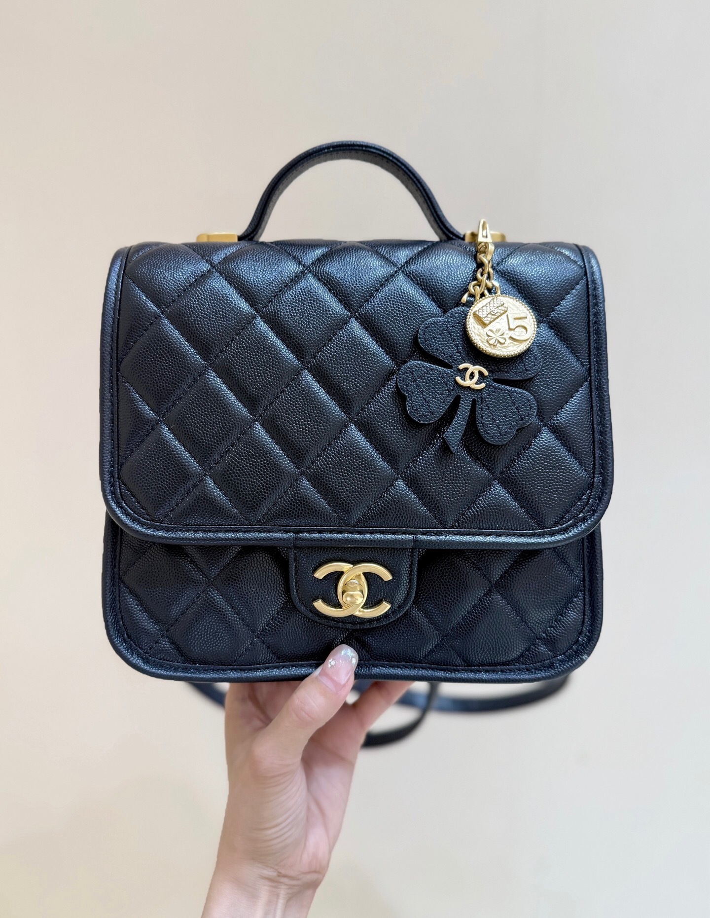 Chanel flap bag Black gold-tone interlocking CC logo