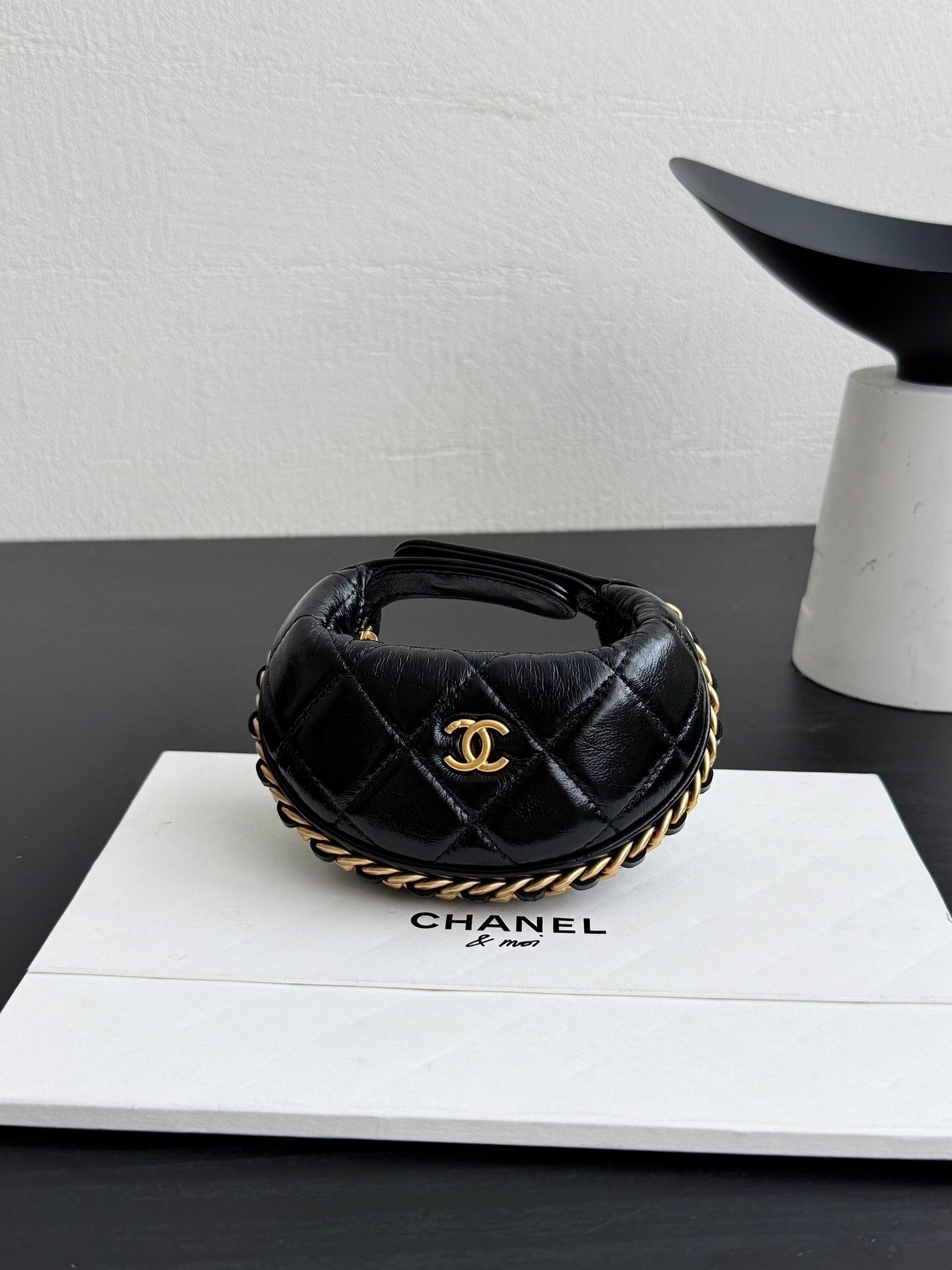 Chanel Shiny Crumpled Lambskin Quilted Chain Around Mini Pouch in black