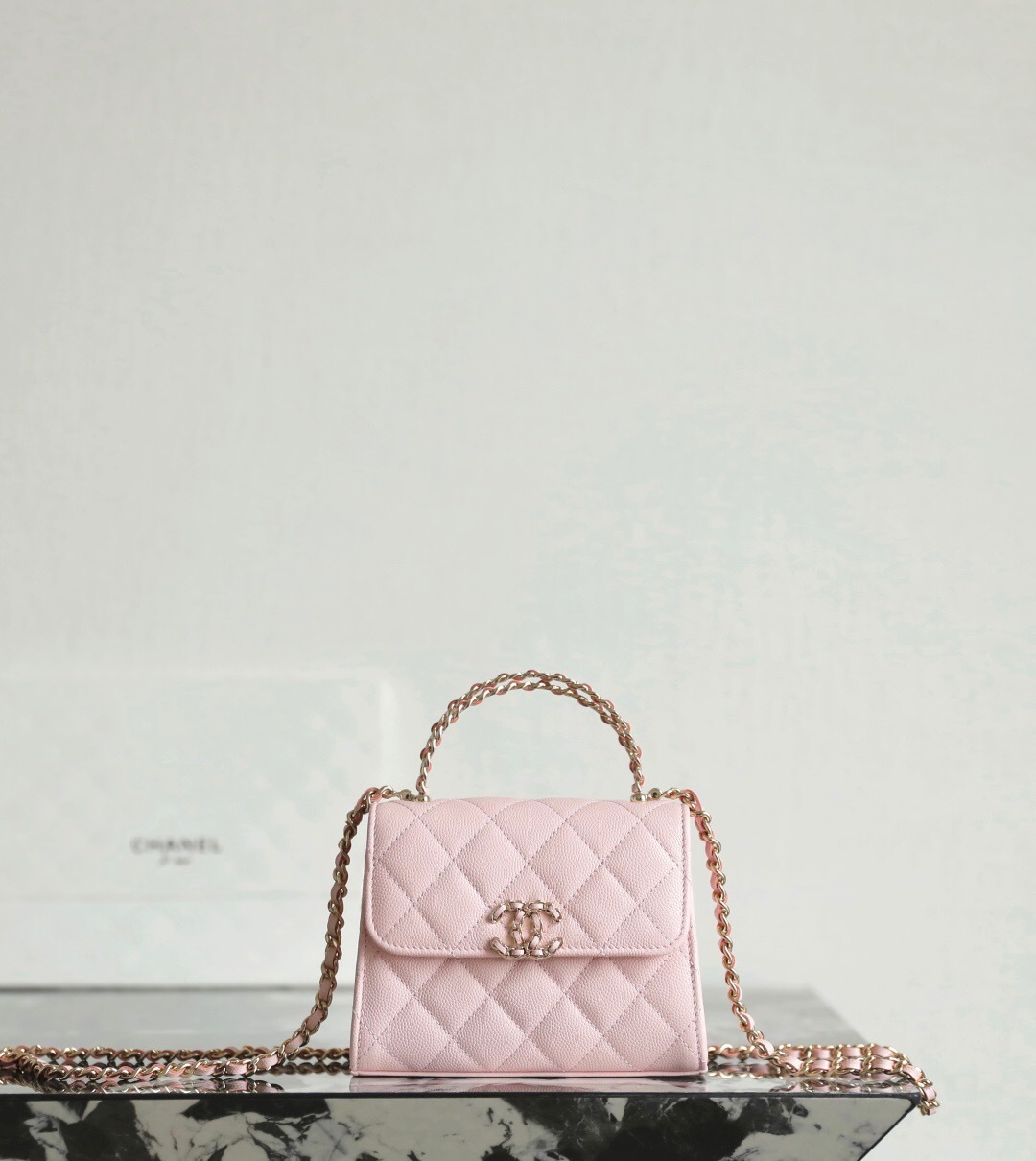 Chanel Kelly mini clutch with chain in pink quilted leather
