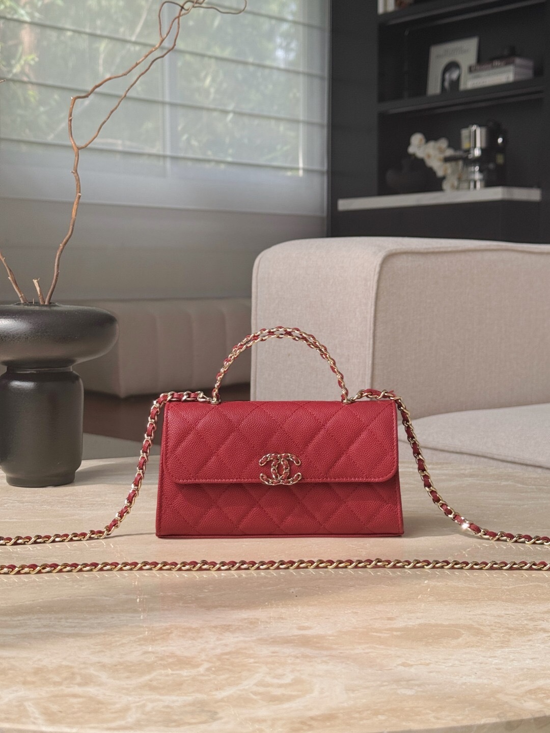 Chanel Kelly top handle bag in red quilted caviar leather