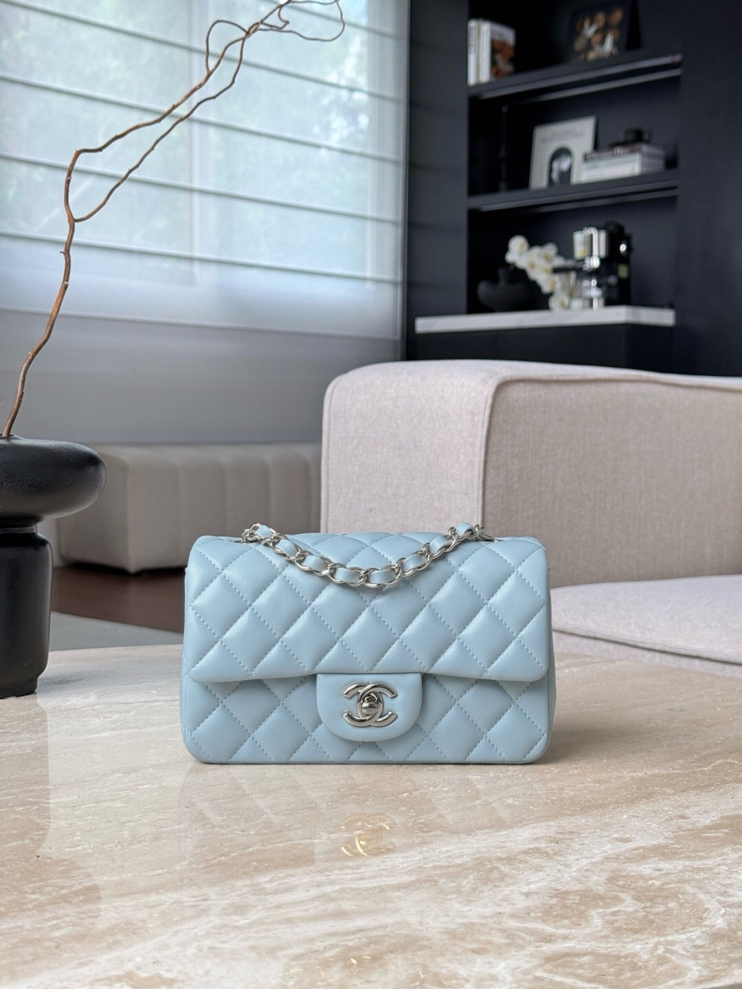 Chanel Classic Flap bag in a light blue color