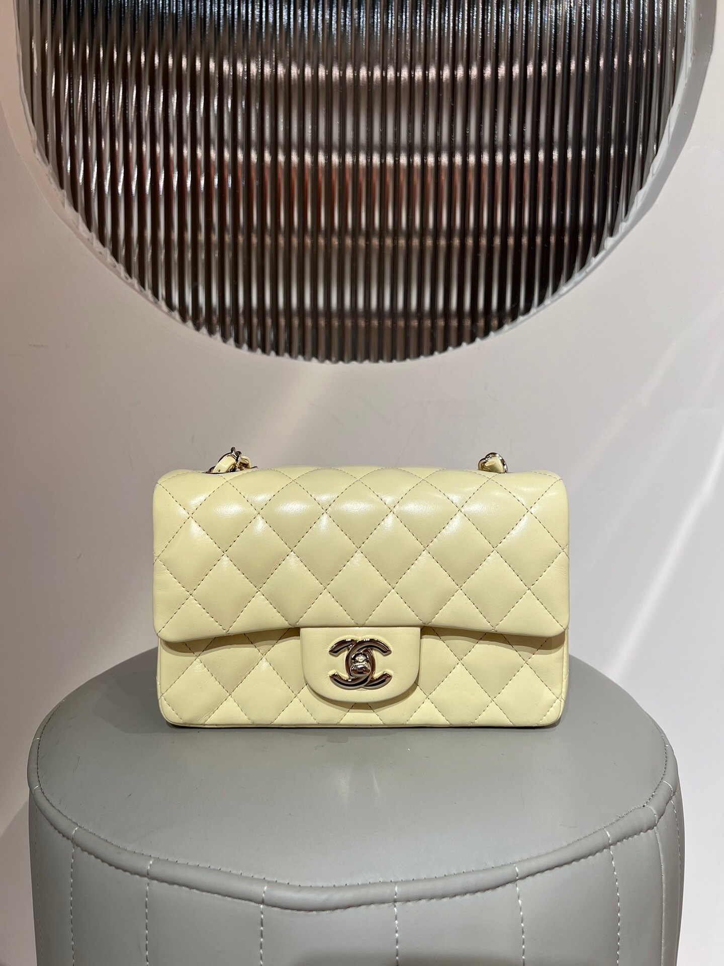 Chanel Classic Mini Flap Bag in a pastel yellow color shoulder bag