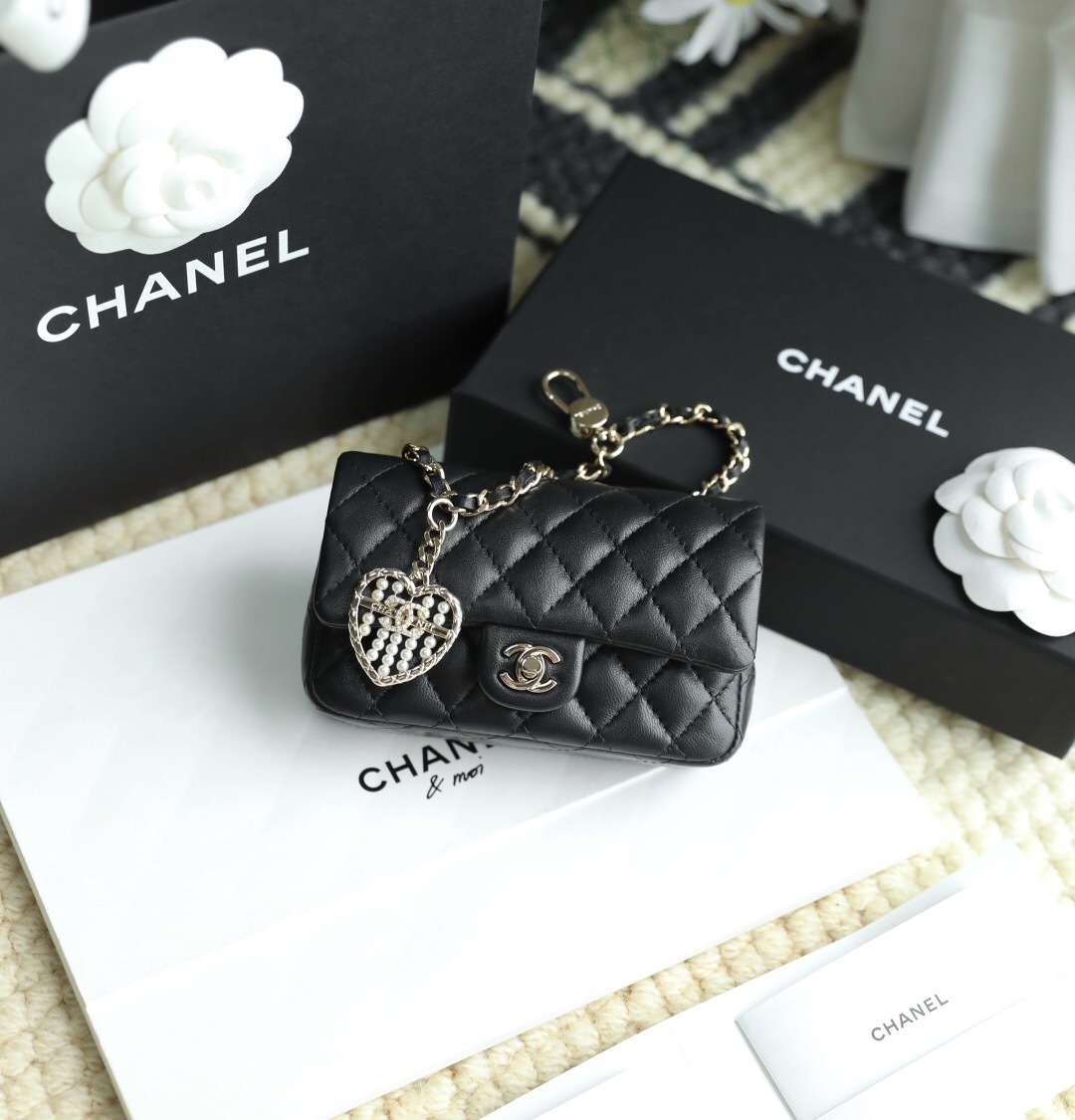 Chanel Classic Mini Bag with Hook Bag Charm in black lambskin leather with light gold-tone hardware