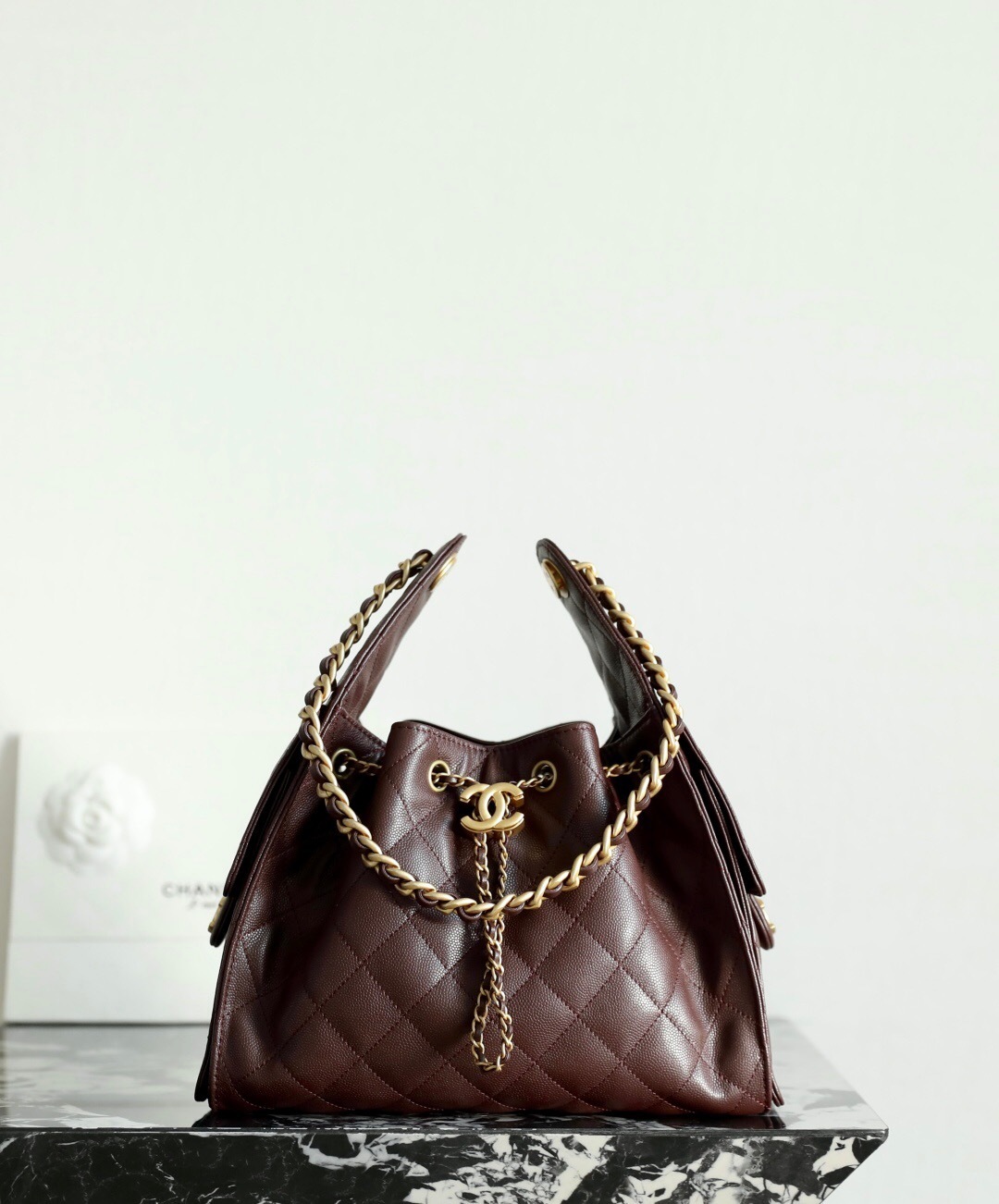 Chanel 25 small handbag in dark brown grained calfskin with gold-tone metal hardware bucket bag