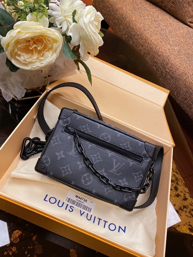 LV Mini Soft Trunk bag in Monogram Eclipse canvas.