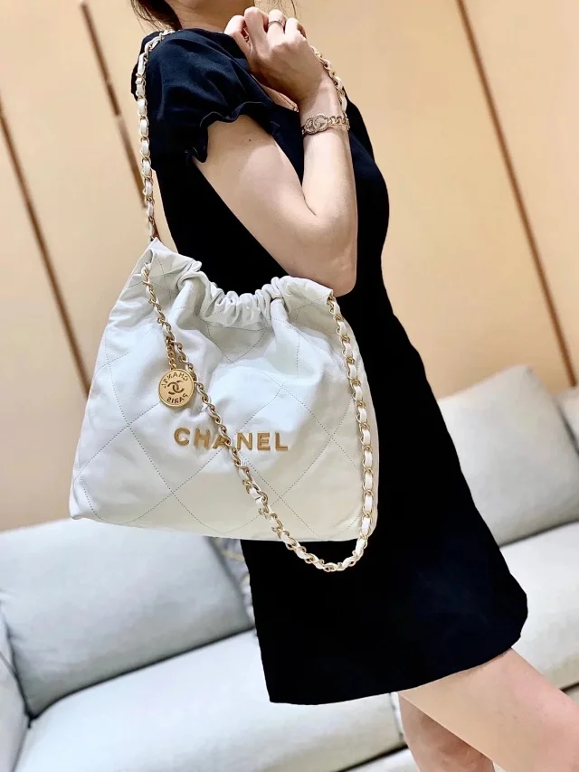 Chanel 22 handbag in calfskin leather shoulder bag with a gold-tone metal logo and hardware all colors