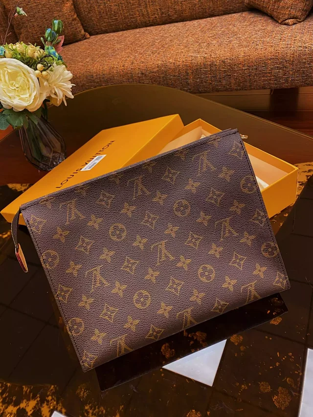 LV Toiletry Pouch in Monogram canvas.