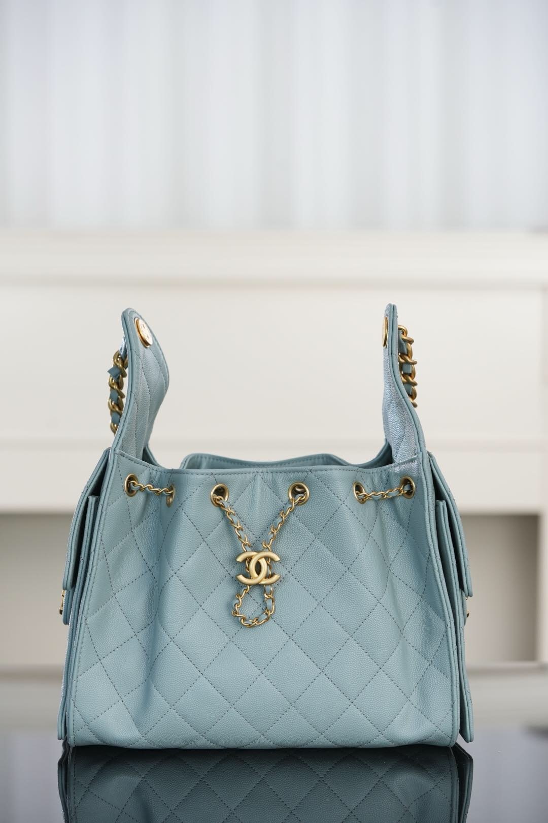 Chanel 25 Small Hobo Bag in light blue caviar leather with antique gold hardware