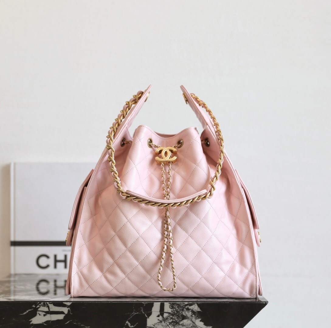 Chanel 25 handbag in light pink grained calfskin leather with gold-tone metal hardware bucket bag