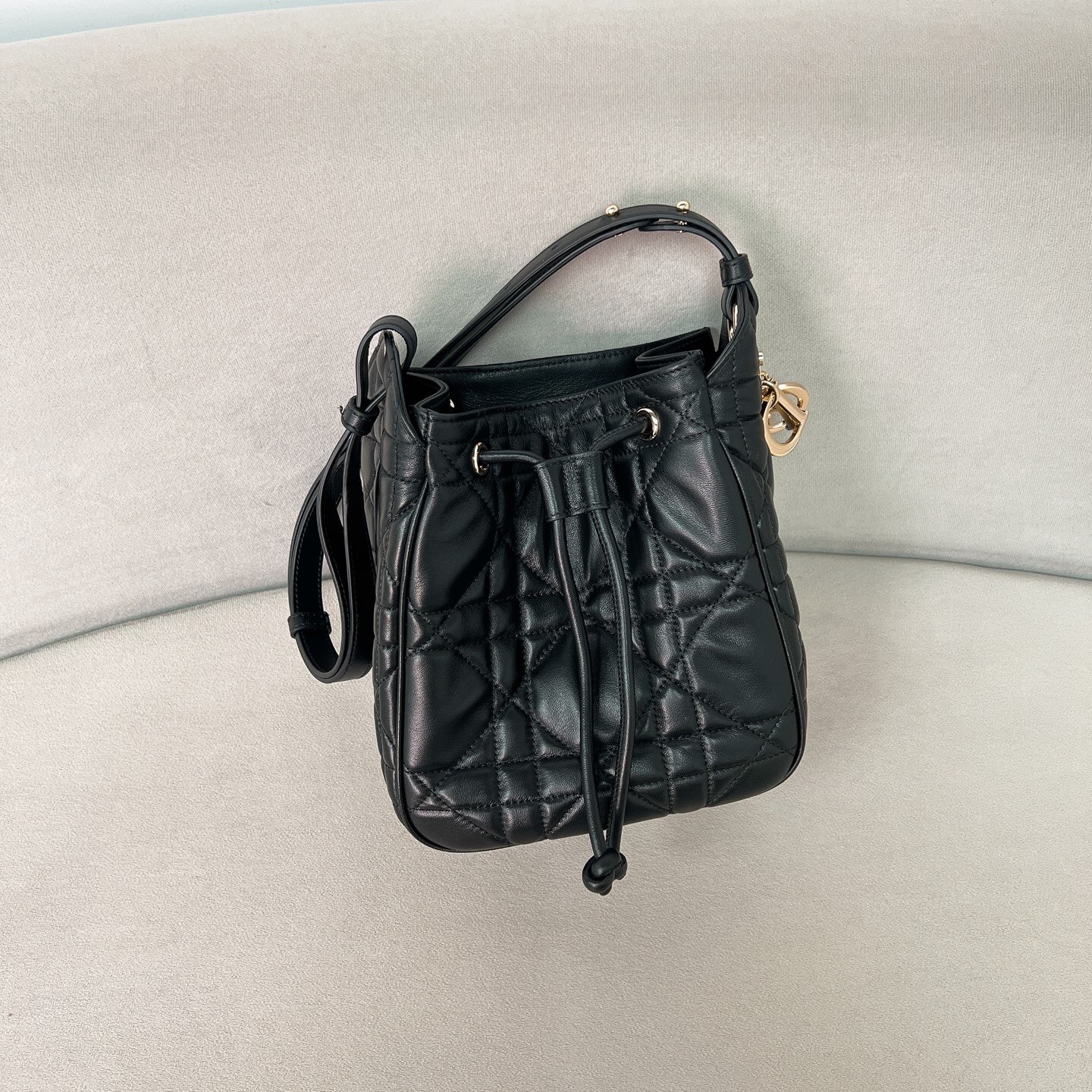 Dior D-Motion bucket bag in black Macrocannage lambskin