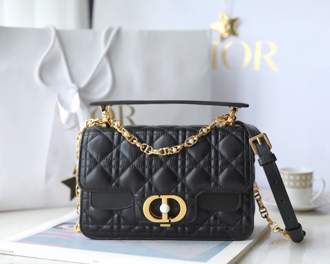 Dior Jolie Top Handle mini bag in black Cannage calfskin.