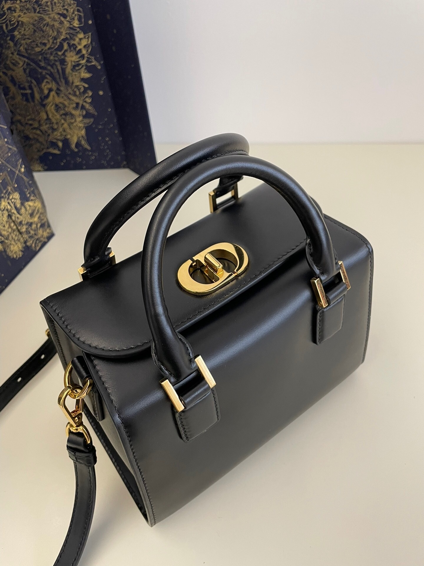 Dior handbag with a CD lock closure black leather tote bag