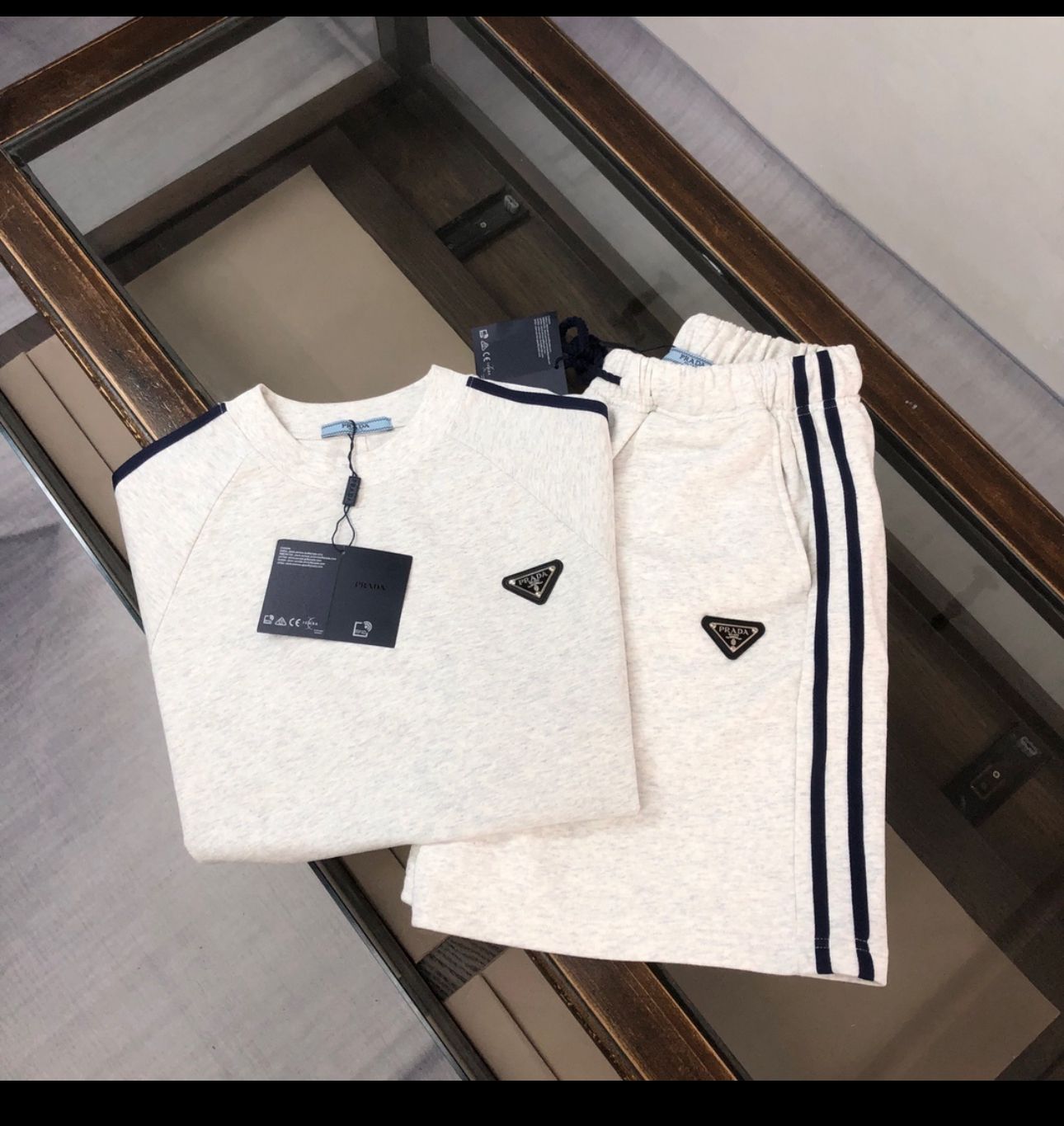 Prada cotton t-shirt with tracksuit a black triangle logo